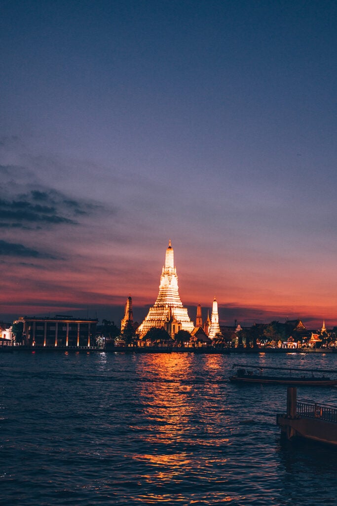View of Wat Arun at night from Chao Praya River